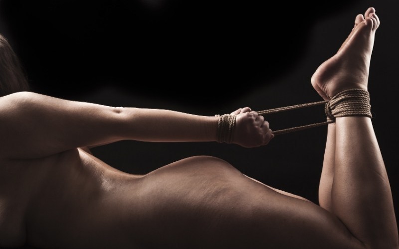 Woman tied in bondage