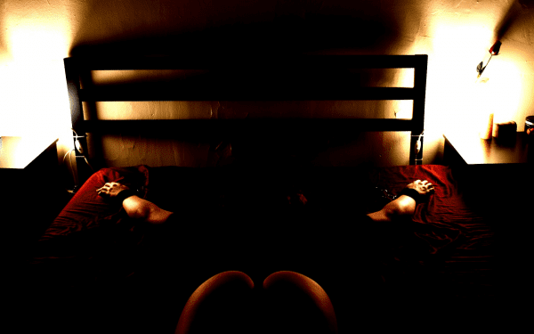 Under the bed restraints in use
