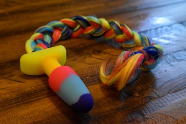 Butt plug with a braid