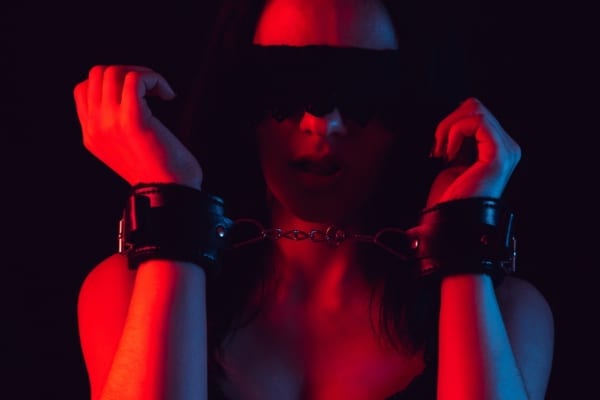 Woman blindfolded and restrained foreplay suggestionjpg