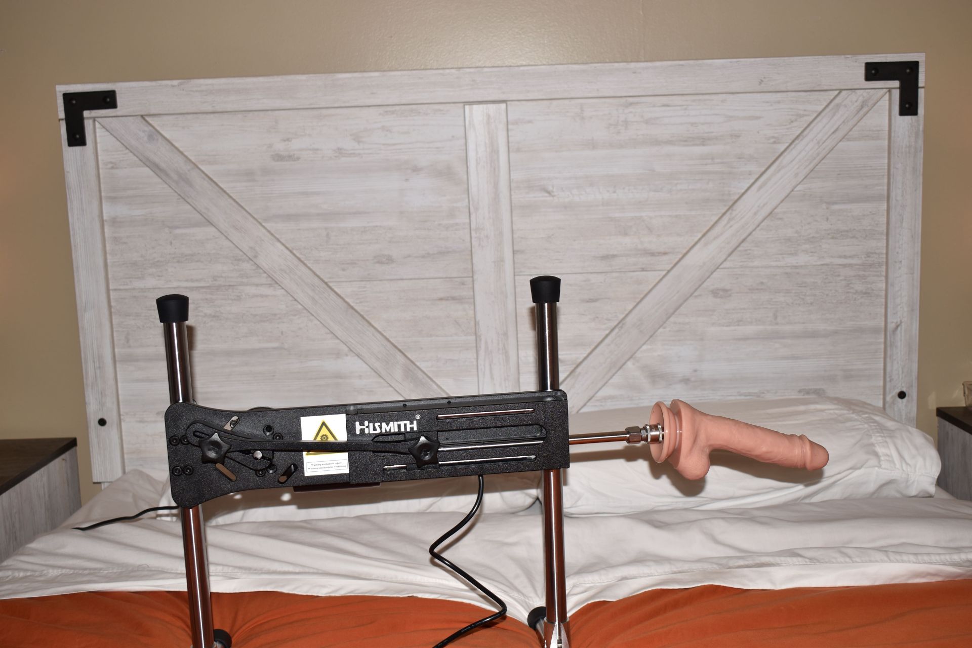 Hismith sex machine with our giant headboard in the background