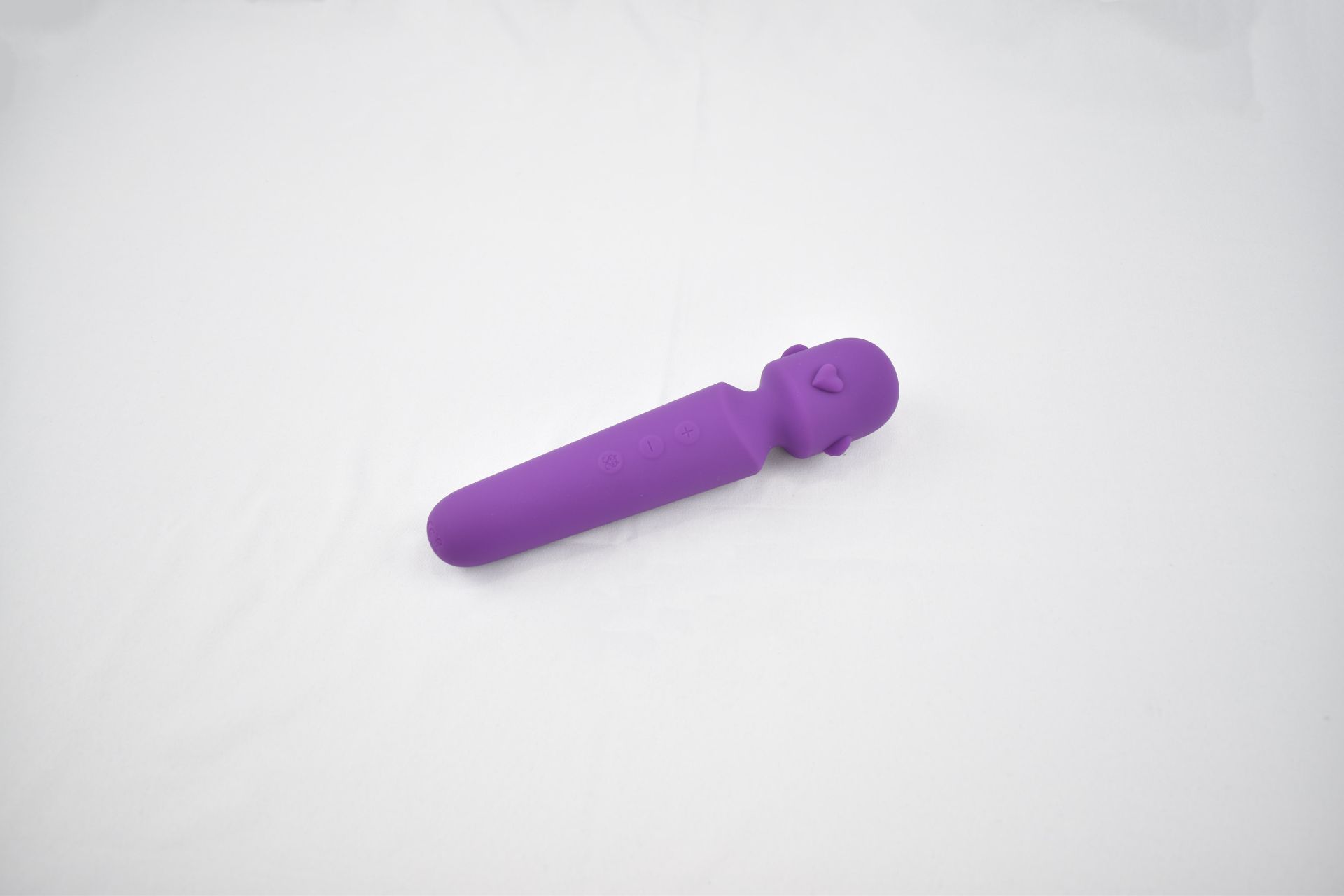 Session Heart Wand Vibrator on a white table