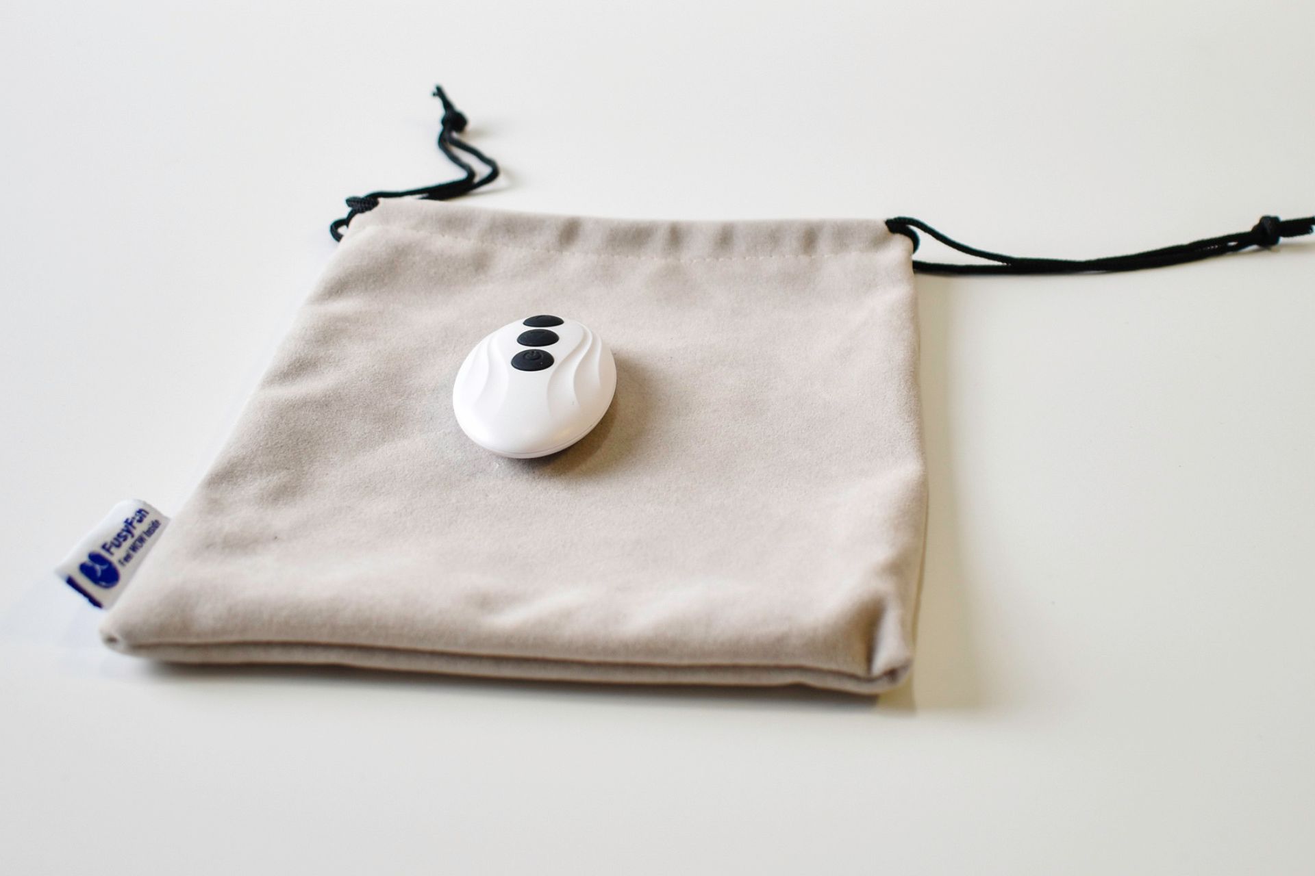 Wave remote control on a storage pouch