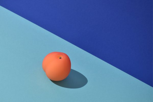Artistic photo of womanizer peach