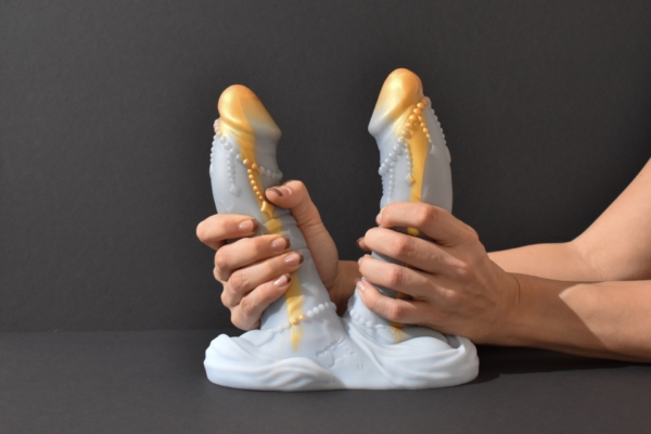 Hands holding Nothosaur Gemini