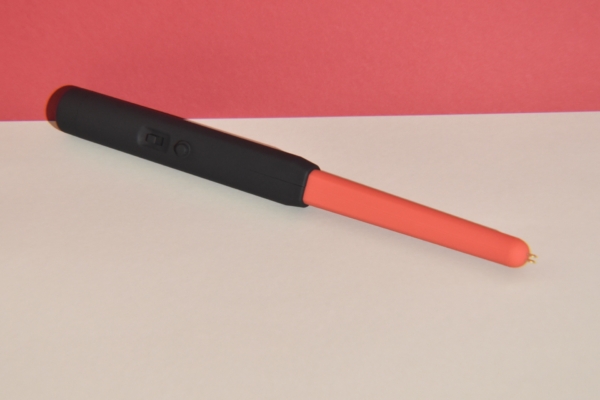 hand pressing a button on Zapper 2.0