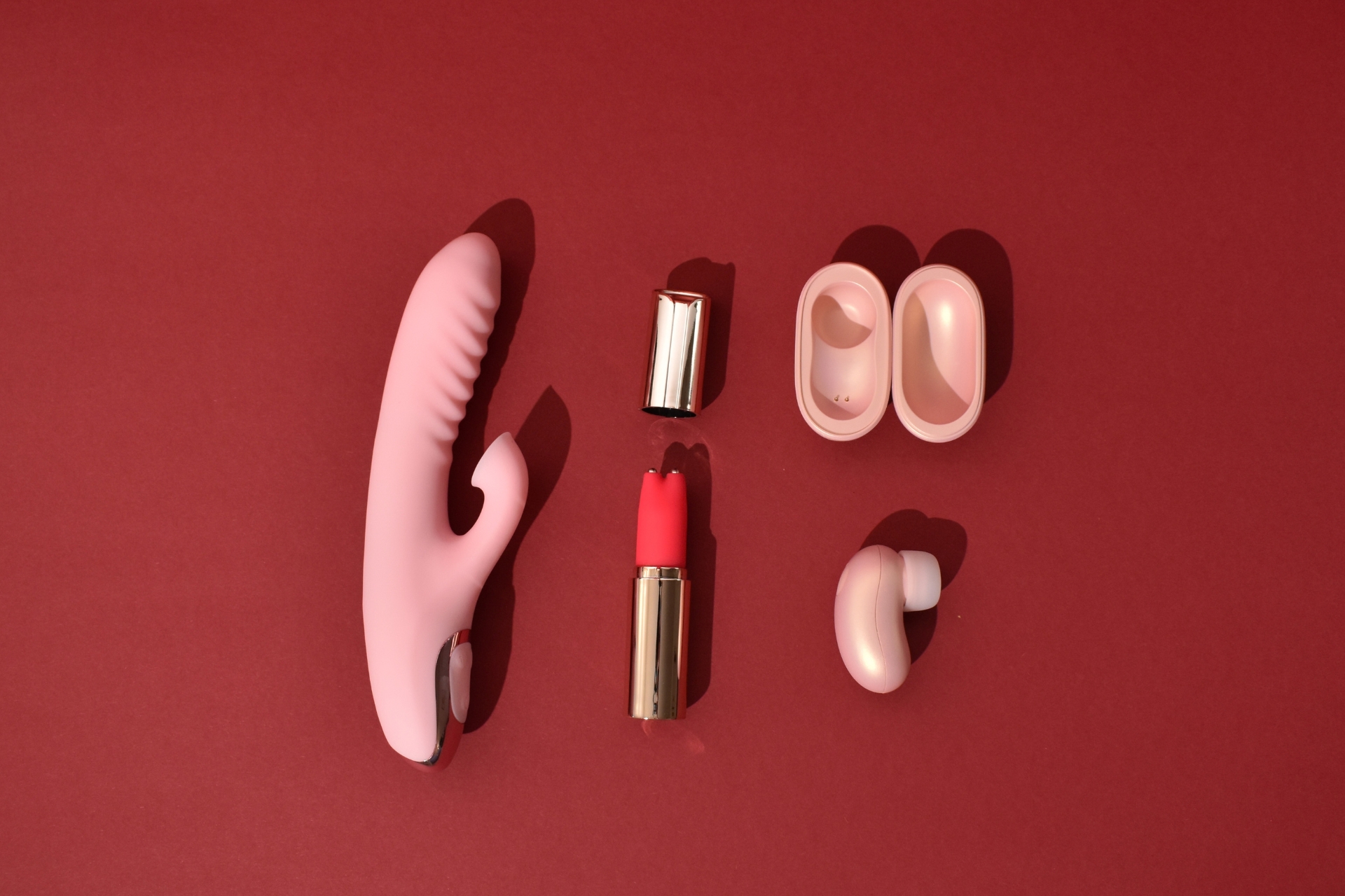 Mini Earbud, Wave Rabbit and Betty Lipstick sex toys top view
