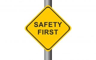 Safety first road sign
