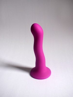 Suction cup dildo on a white background