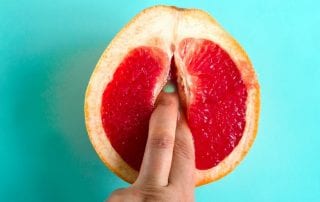 two fingers in a grapefruit masturbation concept