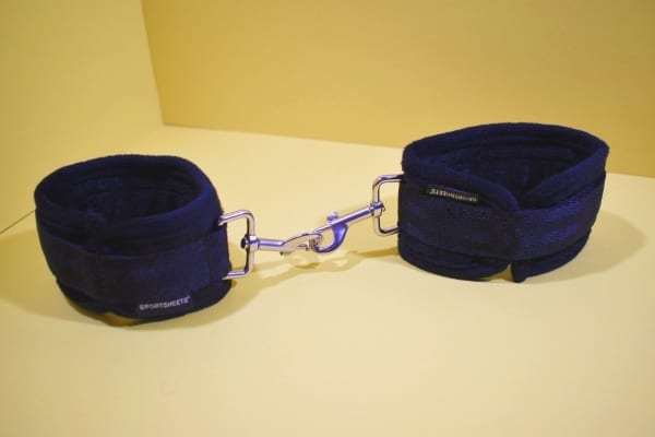 Cuffs from under the bed restraint system