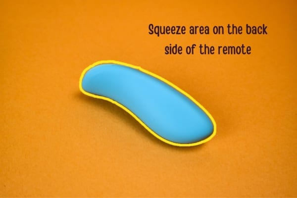 Squeeze area on the back side of We-Vibe Chorus remote