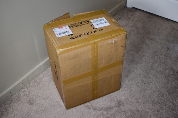 Sex doll in a big cardboard box