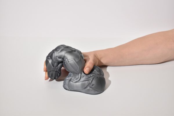 hand squishing Nothosaur Rocco