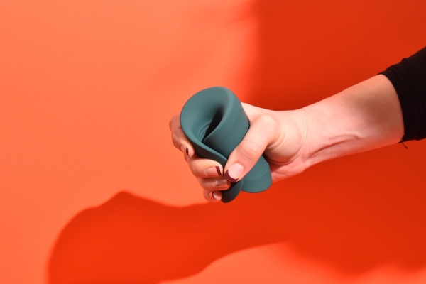 hand holding Lovense Gush 2