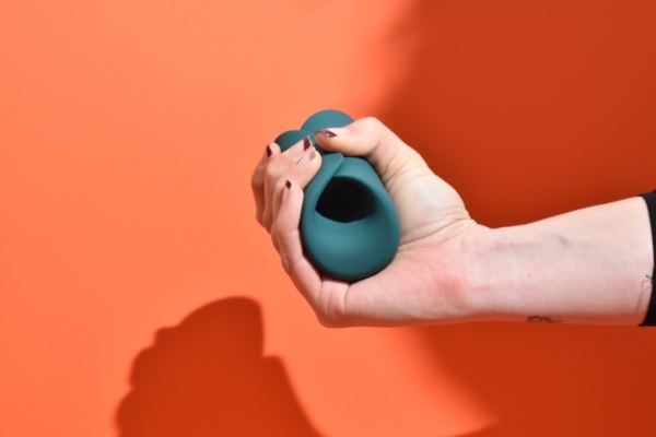 hand squeezing Lovense Gush 2